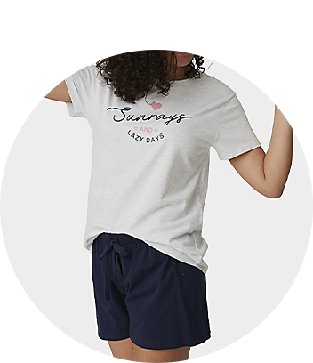 womens white sunny top and navy shorts